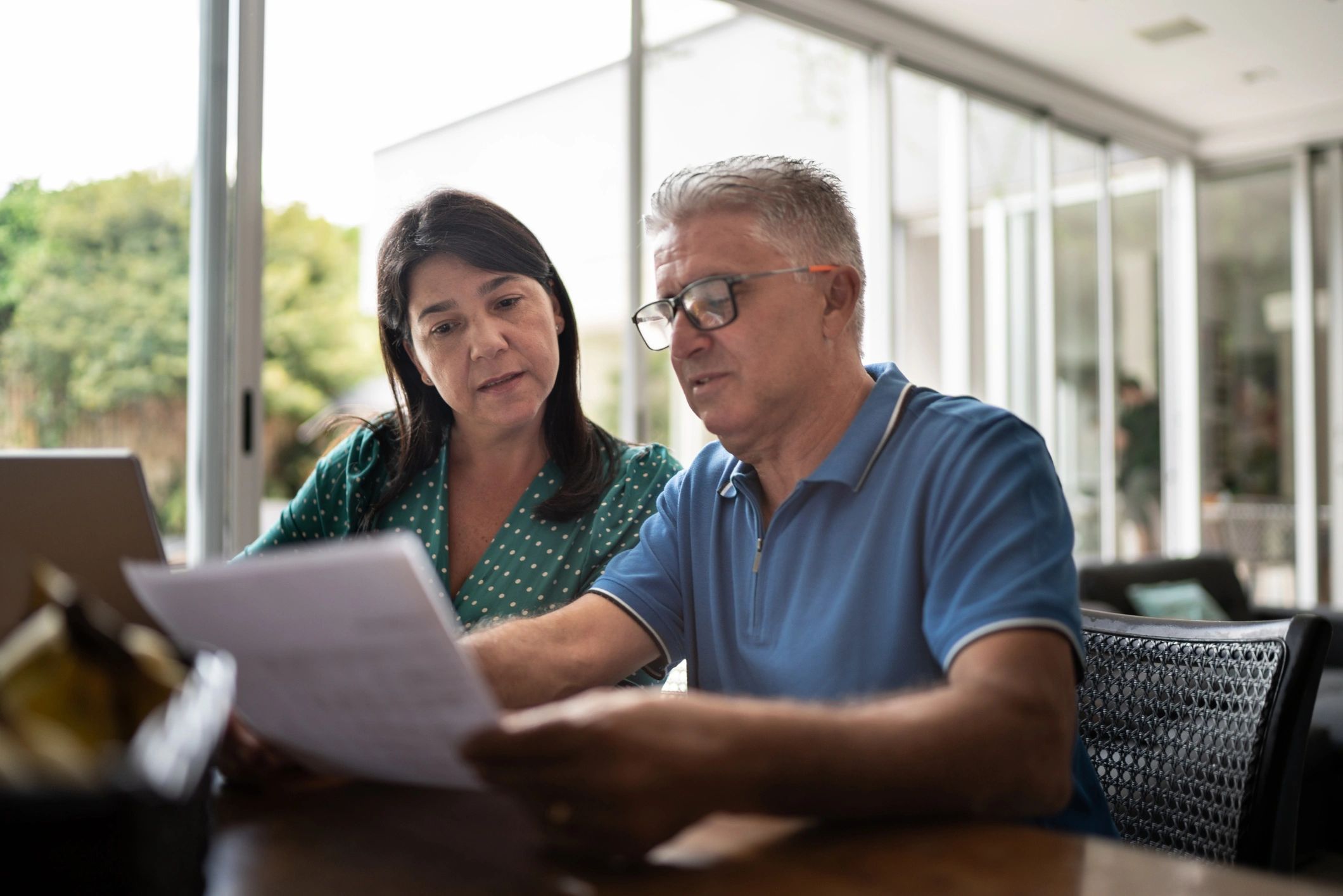 Couple reviewing household finances together